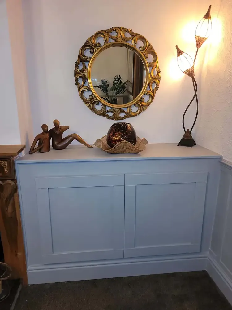 Painted hallway cabinet with panelled doors